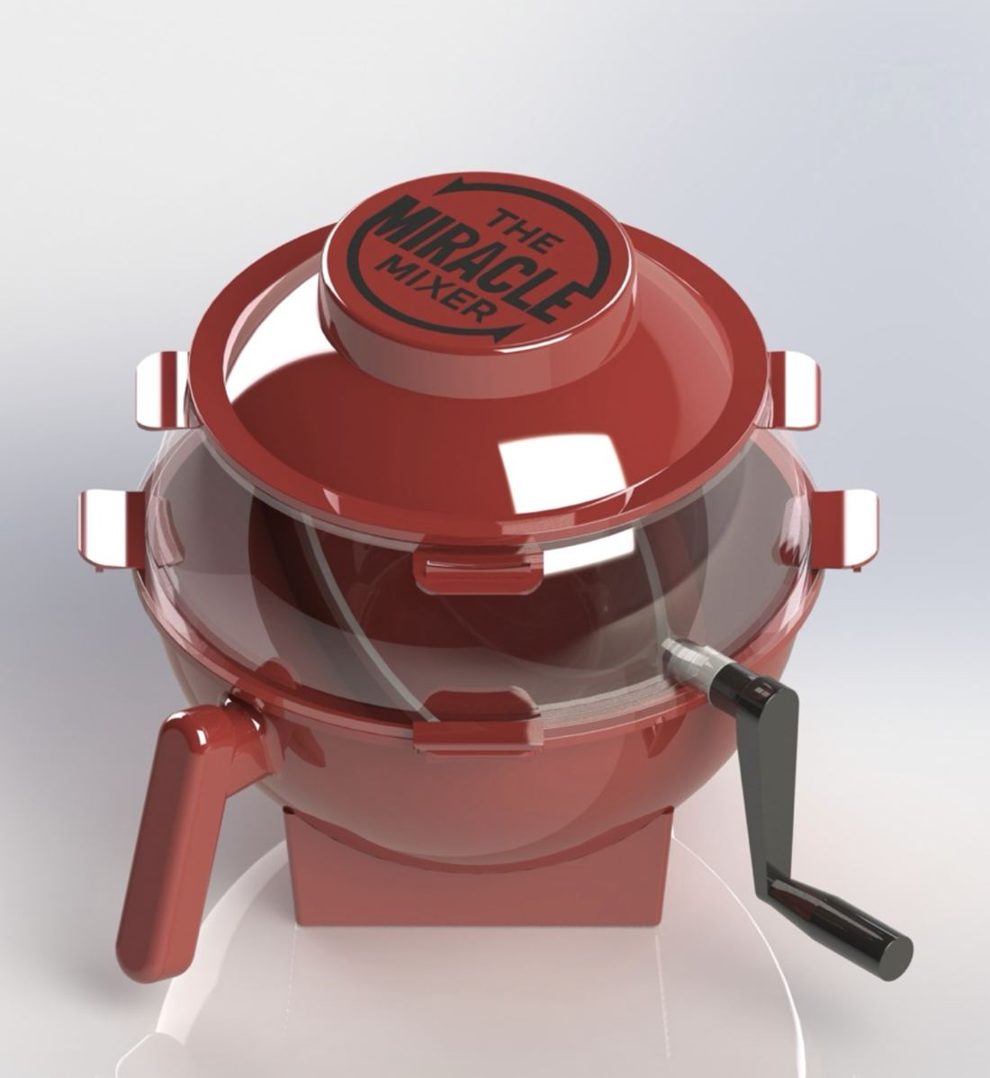 The Miracle Mixer: red spherical bowl with clear dome, red logo lid, side handle, black hand crank and stand base